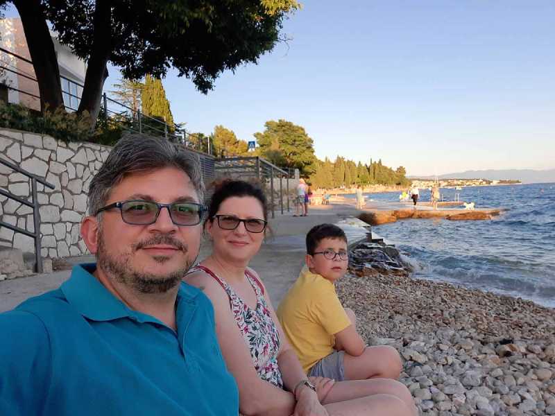 Igor Mateski enjoying time with his family on the beach.