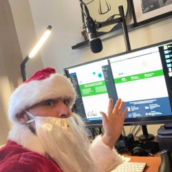 Frank Pereira, Lead Web Developer working in his Santa costume